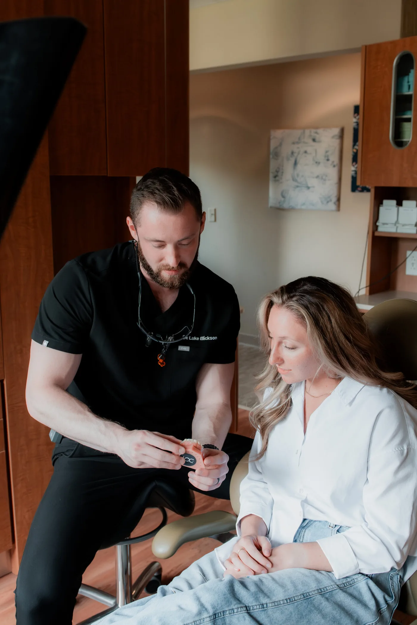Dr. Ellickson discussing cosmetic options with a patient