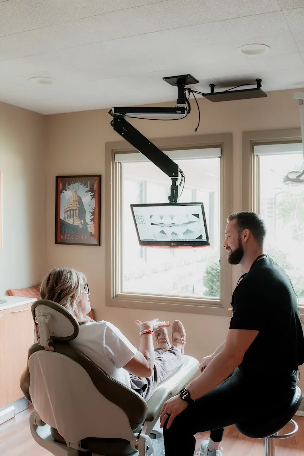 Comfortable treatment room with overhead monitor